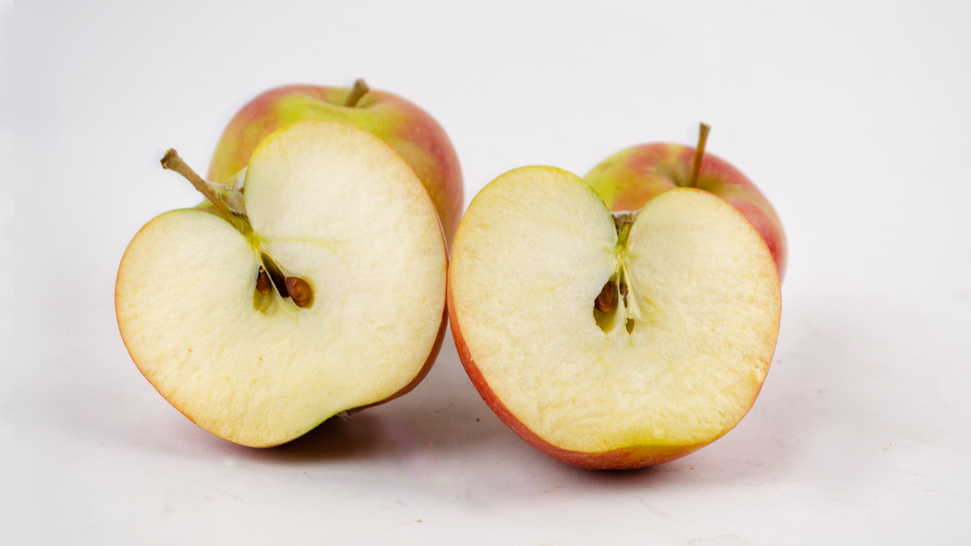 wellant-Apfel-halbiert Apfel Wellant Kiste